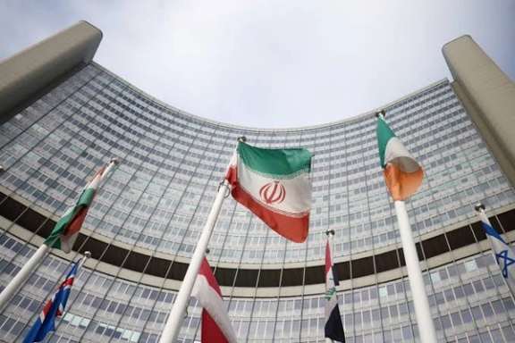 The Iranian flag waves in front of the International Atomic Energy Agency (IAEA) headquarters in Vienna, Austria, March 1, 2021.