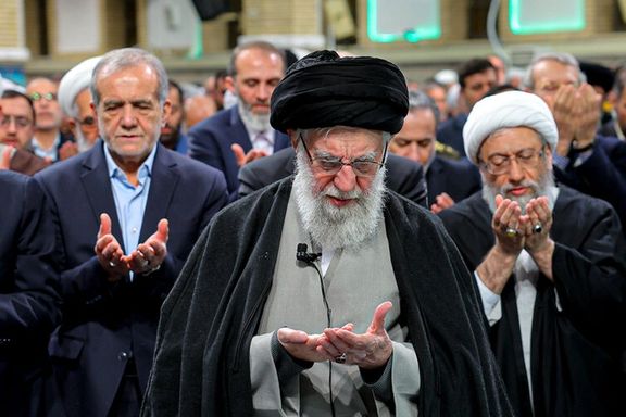 Iran's supreme leader Ali Khamenei leading prayers, president Masoud Pezeshkian behind him, Tehran, March 8, 2025