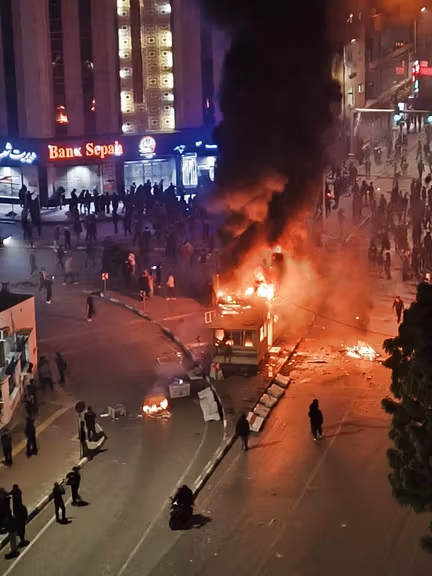 Millions of Iranians take to the streets as protest death toll hits 42