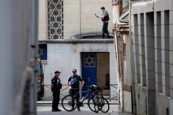 French police work at the scene after officers shot dead an armed man earlier who set fire to the city's synagogue in Rouen, France, May 17, 2024.
