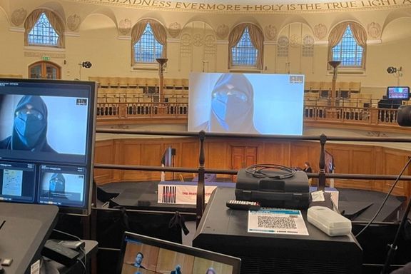 Witnesses with hidden faces testifying in 'Aban' atrocities tribunal.