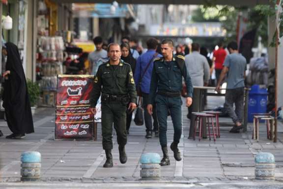 Iran's police forces walk on a street during the revival of morality police in Tehran, Iran, July 16, 2023.