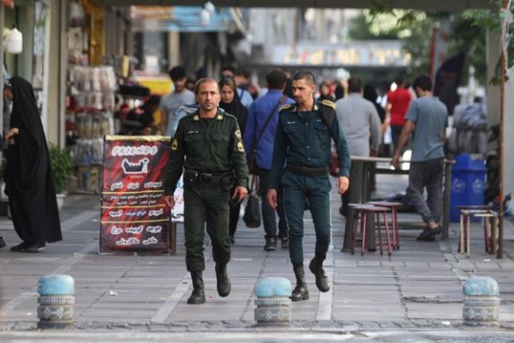 Iran's police forces walk on a street during the revival of morality police in Tehran, Iran, July 16, 2023.