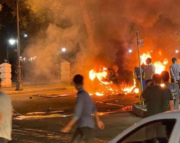 People set a police vehicle on fire in Sabzevar on September 20, 2022