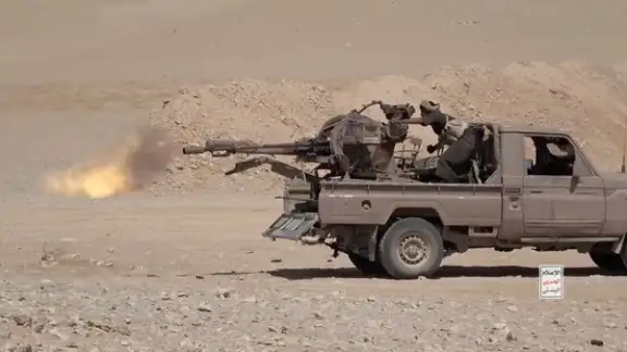 An Iran-aligned Houthi fighter fires from a vehicle in a screengrab from a video said to show Houthi fighters attacking Saudi-backed forces in the location given by the source as al Jawf governorate, Yemen, in this screengrab taken from a video released by Houthi Military Media on September 15, 2026.