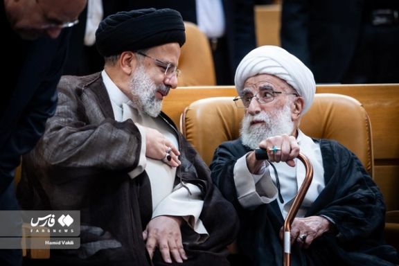 Ayatollah Ahmad Jannati (right) and President Ebrahim Raisi during an event in Tehran in June 2023