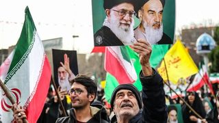 Tehran's cautious talk signals meet Revolution Day rhetoric