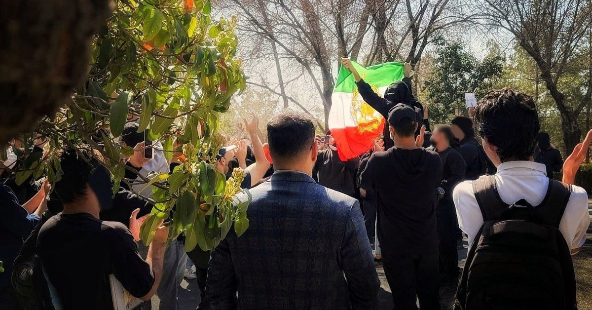 Iran students adopt monarchist symbols as protests grow for third day