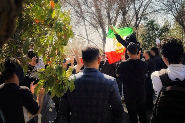 Iran students adopt monarchist symbols as protests grow for third day