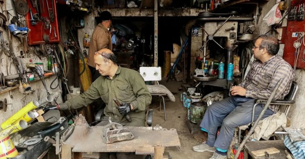 Iran’s truck repair hub feels the squeeze as work dries up
