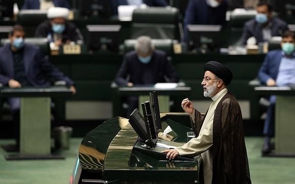 President Raisi addressing the parliament in 2022