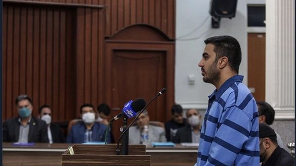 A photo of Majidreza Rahnavard in court where he was forced to say he was eager to be punished. Nov. 30, 2022