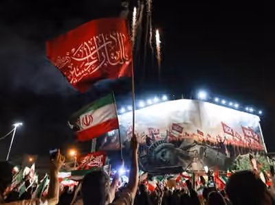 Iran shrugs off US economic war as analysts sound alarm