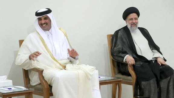 Qatar's Emir with the Iranian president during meeting with Khamenei. May 12, 2022