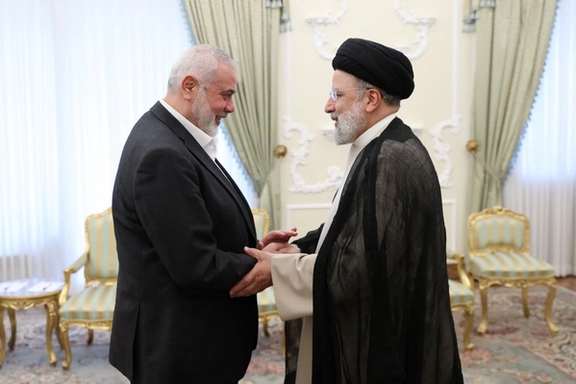 Iranian President Ebrahim Raisi meets with Palestinian group Hamas' top leader, Ismail Haniyeh, in Tehran, Iran March 27, 2024.
