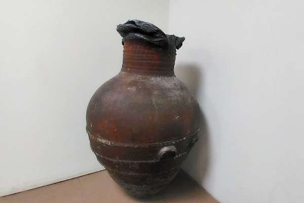 Iranian Medes-Era Clay Jug Repurposed As Trash Bin