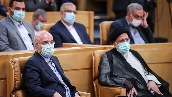 Parliament Speaker Ghaibaf (L) and President Raisi on April 2, 2022