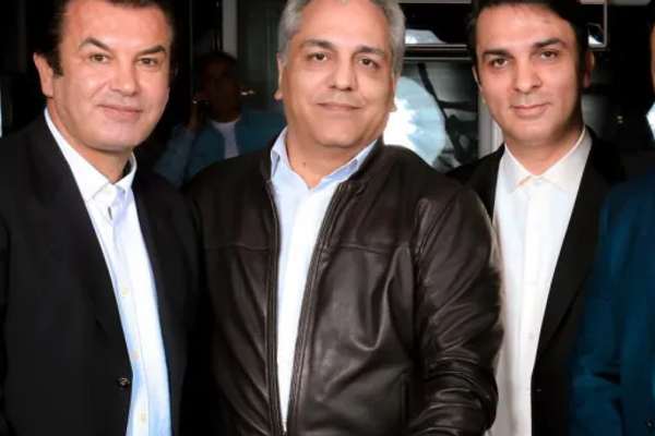 Iran Football Manager To Visit Canada Seen With Man Wanted By FBI