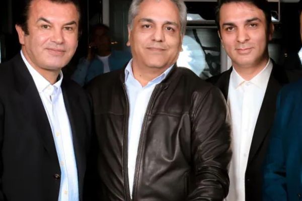 Iran Football Manager To Visit Canada Seen With Man Wanted By FBI