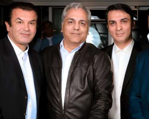 Hamid Estili (L) with Mahmoud Khazein in a party on April 8, 2022