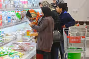 War or government failure? Record inflation fuels political battle in Iran