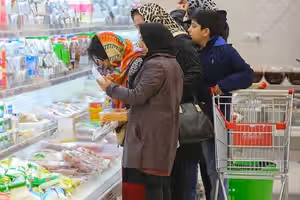 War or government failure? Record inflation fuels political battle in Iran