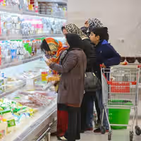 War or government failure? Record inflation fuels political battle in Iran
