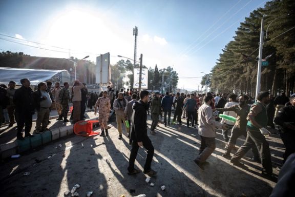People gather at the scene of explosions during a ceremony held to mark the death of late Iranian General Qassem Soleimani, in Kerman, Iran, January 3, 2024.