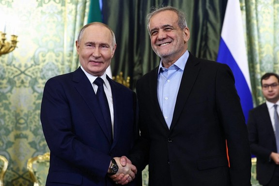 Russian President Vladimir Putin and Iranian President Masoud Pezeshkian shake hands as they meet in Moscow, Russia January 17, 2025.