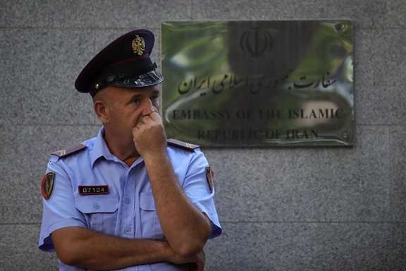 A police officer stands in front of the Embassy of the Islamic Republic of Iran, as Albania cuts ties with Iran and orders diplomats to leave over cyberattack, in Tirana, Albania, September 8, 2022.