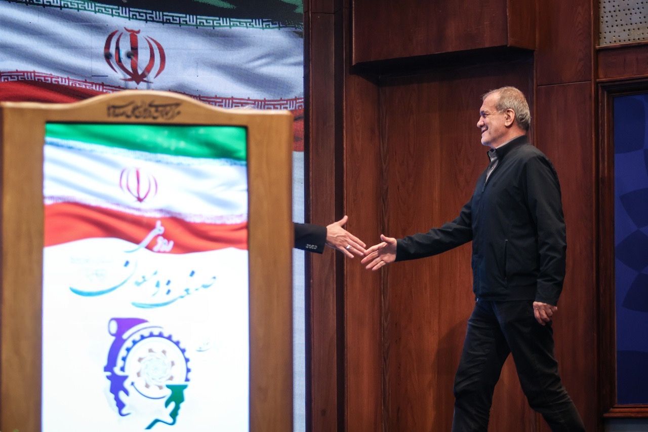 Iranian President Masoud Pezeshkian arrives to address a ceremony marking Iran's National Industry and Mine Day in Tehran, July 21, 2026