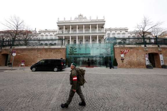A member of Austrian armed forces walks past Palais Coburg, the site of a meeting of the Joint Comprehensive Plan of Action (JCPOA), in Vienna, Austria, February 8, 2022