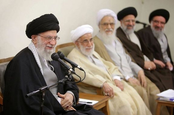 Iran's Supreme Leader Ali Khamenei (left) during a meeting with several senior officials in attendance