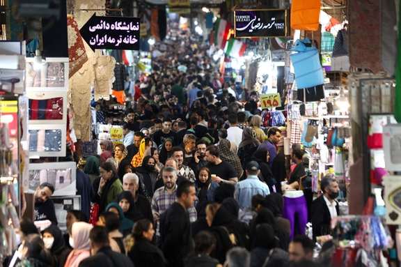 Iranian people walk at the Tehran Bazaar, ahead of Norouz (Nowruz), the Iranian New Year, in Tehran, Iran March 18, 2024.