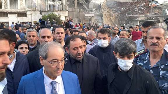 Syrian Foreign Minister Faisal Mekdad walks near the damaged site of Iran’s consulate in Damascus, on April 1, 2024.
