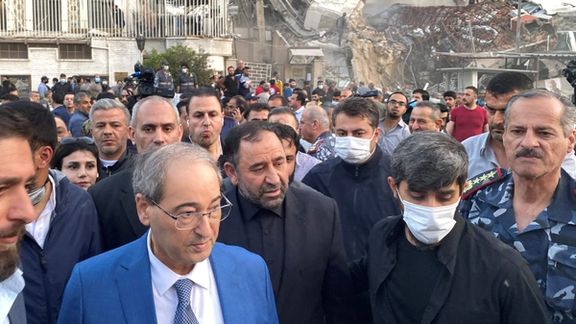 Syrian Foreign Minister Faisal Mekdad walks near the damaged site of Iran’s consulate in Damascus, on April 1, 2024.