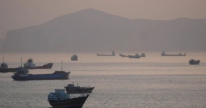Iran takes US response to cabinet, Hormuz clashes continue