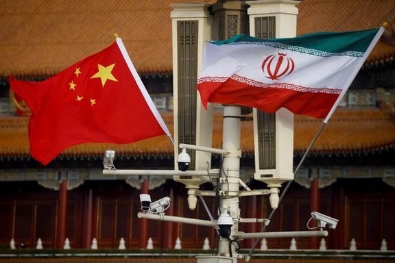 The national flags of China and Iran fly in Tiananmen Square during Iranian President Ebrahim Raisi's visit to Beijing, China, February 14, 2023