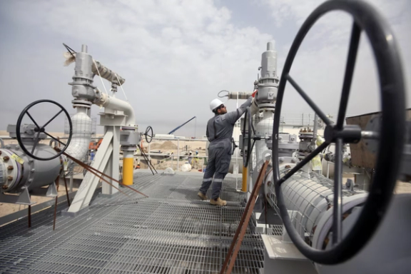A worker is seen at Iraq's Majnoon oilfield near Basra, Iraq. Picture taken March 31, 2021. REUTERS