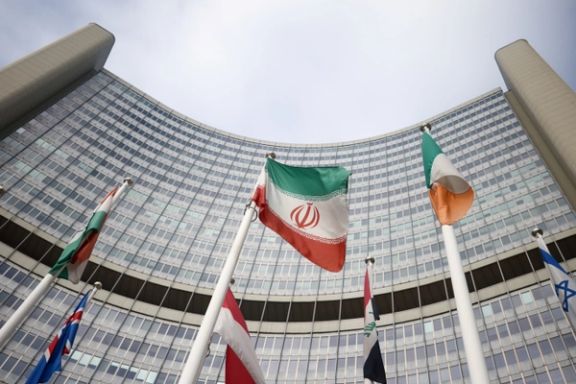 The Iranian flag waves in front of the International Atomic Energy Agency (IAEA) headquarters