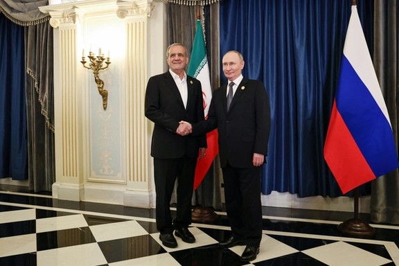 Russia's President Vladimir Putin shakes hands with Iran's President Masoud Pezeshkian during a meeting on the sidelines of the Shanghai Cooperation Organisation (SCO) summit in Tianjin, China, September 1, 2025.
