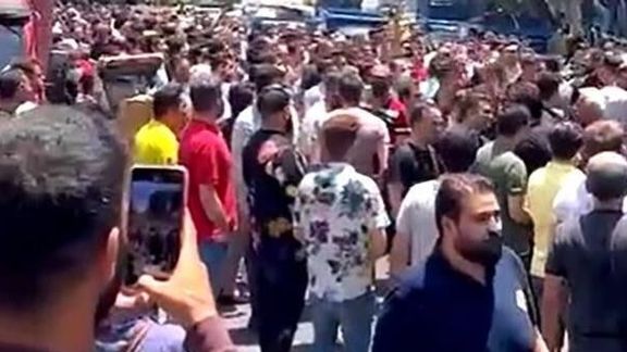 Protests around Tehran Bazaar after another fall of the national currency. June 11, 2022