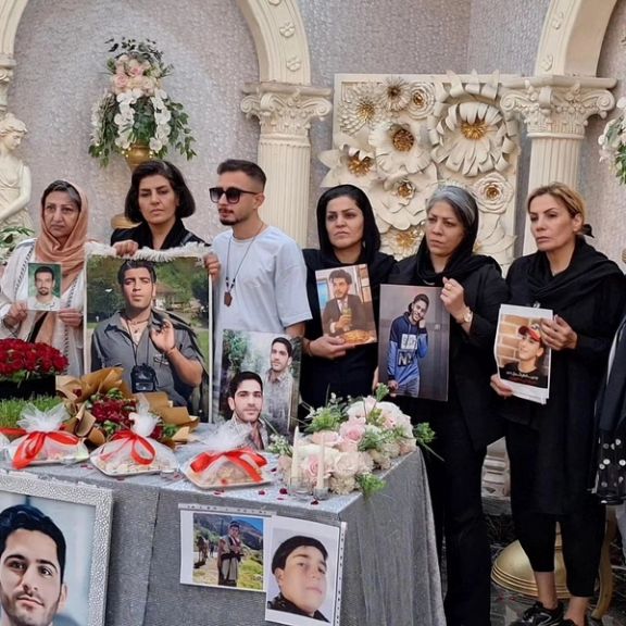 Grieving families holding a memorial ceremony for their loved ones who died during the 2022 Woman Life Freedom movement, 19 September 2024