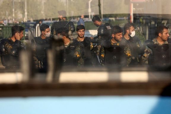 Iran's riot police forces stand in a street in Tehran, Iran October 3, 2022.