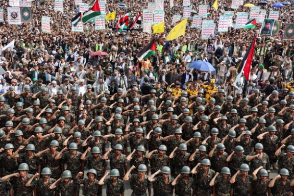 Police troopers chant slogans as they join protesters, predominantly Houthi supporters, during a demonstration in solidarity with Palestinians in Gaza, in Sanaa, Yemen August 15, 2025.