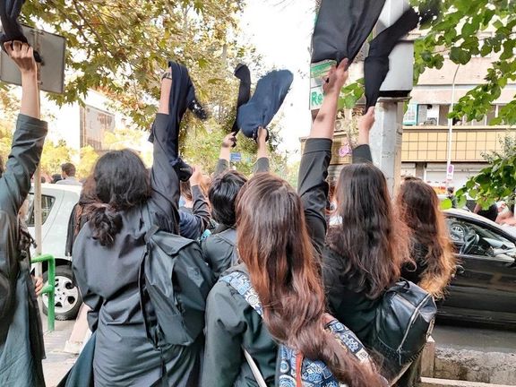 Generation Z schollgirls in Iran taking off their headscarves in defiance of hijab rules. September 2022