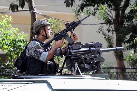 Lebanese Army soldiers keep watch as sectarian clashed take place in Beirut. October 14, 2021