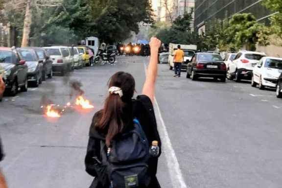 A teenager defying security forces in Rasht on Sept. 20, 2022