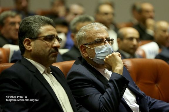 Iranian Oil Minister Javad Owji (right) and National Iranian Oil Refining and Distribution Company Manager Ali-Akbar Nejadali during an event in Tehran (undated)