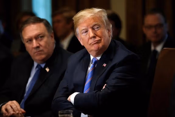 former US Secretary of State Mike Pompeo (left) and former president Donald Trump